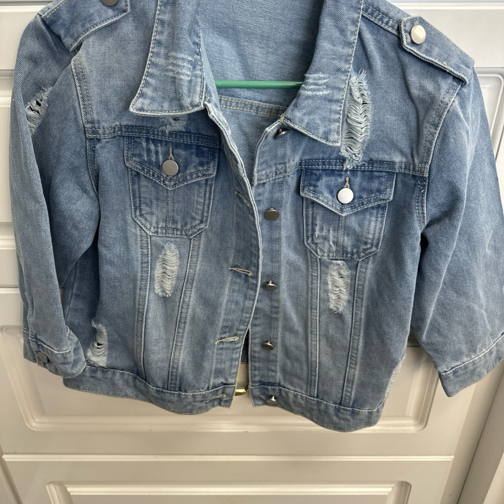 Classic Blue Jean Jacket with Distressed Details